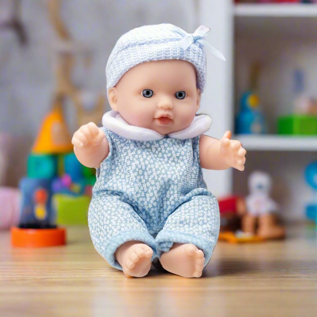 BabyBoo Cutie Baby Doll available in blue and pink outfits, featuring a soft, cuddly body, lifelike facial features, and gentle expression, perfect for nurturing role-play and snuggling.