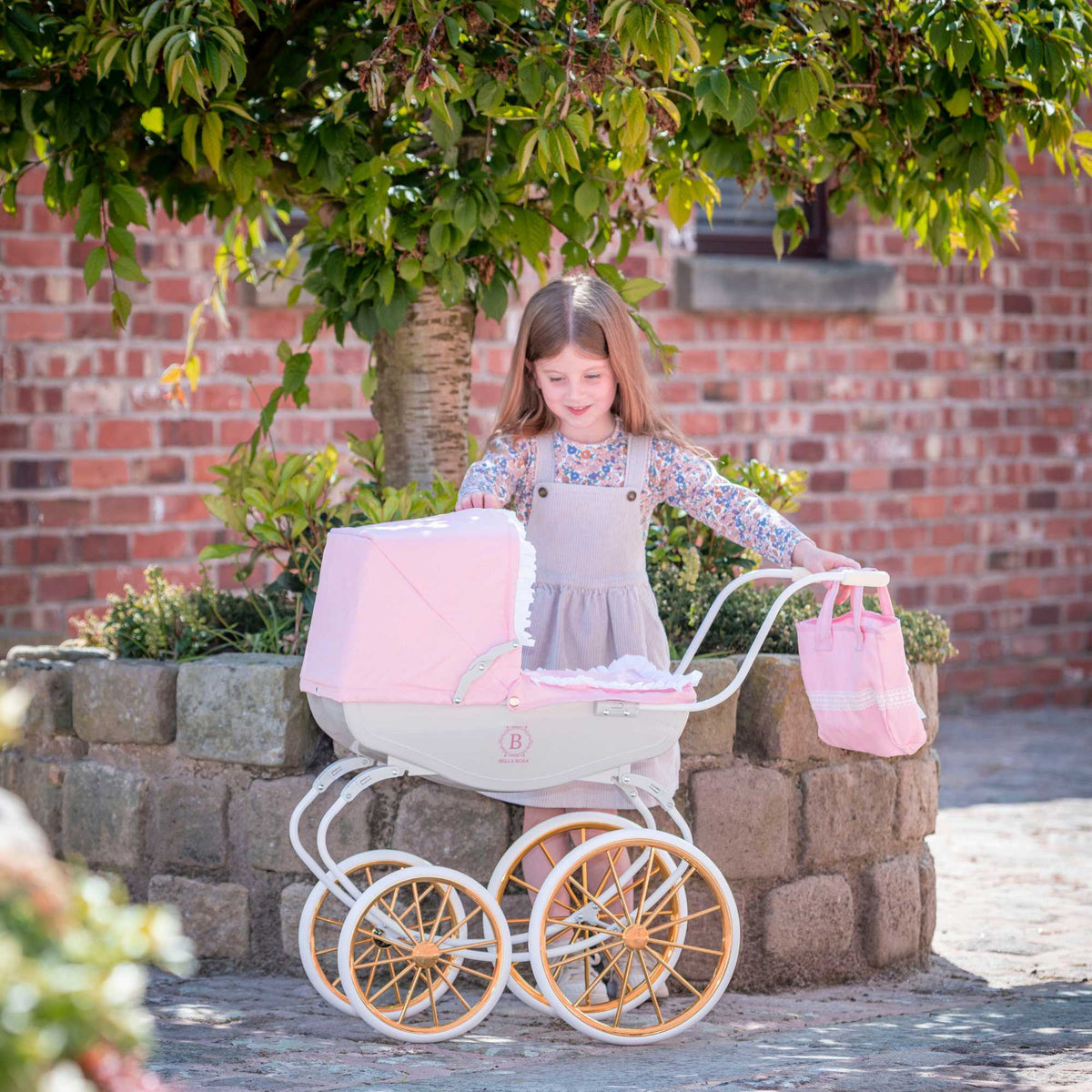 Bella Rosa Cambridge Carriage Dolls Pram - Pink &amp; Rose Gold - Luxurious pink and rose gold pram designed for dolls, offering a stylish and elegant accessory for imaginative play