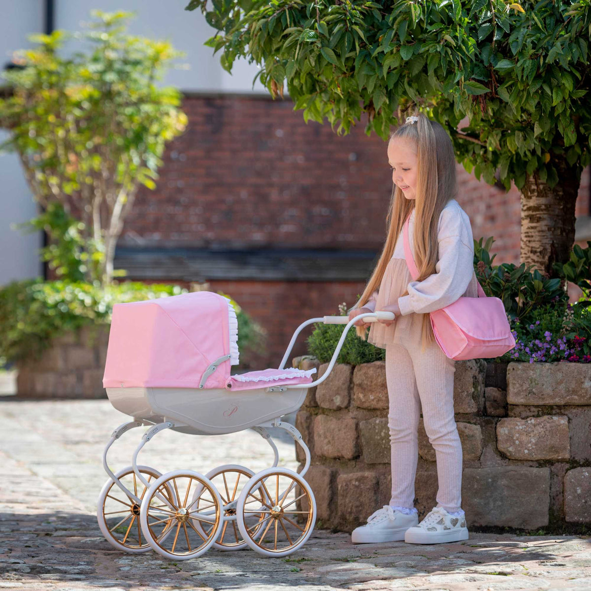 Bella Rosa Cambridge Carriage Dolls Pram - Pink &amp; Rose Gold - Luxurious pink and rose gold pram designed for dolls, offering a stylish and elegant accessory for imaginative play