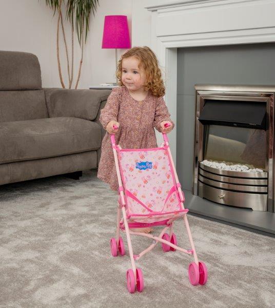 Peppa Pig Single Dolls Stroller, featuring a vibrant design with Peppa Pig-themed accents, ideal for children&#39;s imaginative play with their favourite dolls