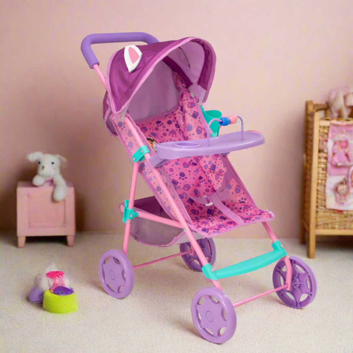 Bright and fun toy pushchair inspired by Gabby&#39;s Dollhouse, ideal for kids to push their favourite dolls and toys. Features a durable frame, smooth-rolling wheels, and colourful designs with beloved characters from the series.