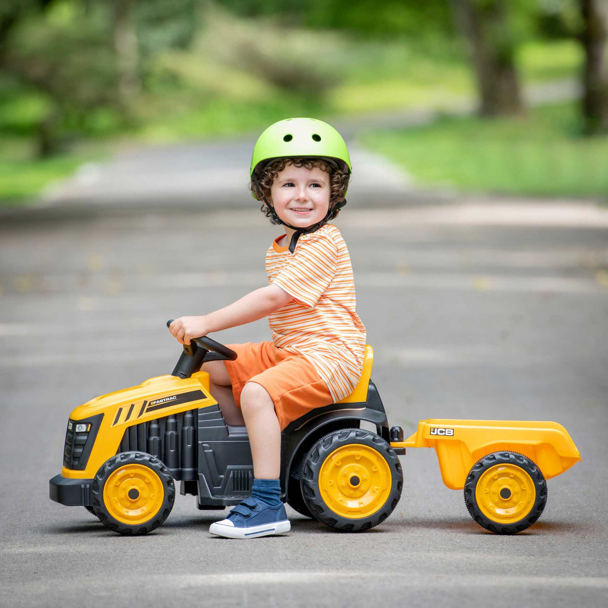 EVO JCB Battery Operated Mini Quad Ride-On with Trailer for 3-year-olds, featuring a yellow and black JCB design, detachable trailer, and safe battery-powered operation for exciting outdoor play.