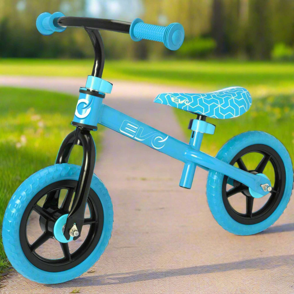 Child riding the EVO Balance Bike outdoors, showcasing the lightweight and durable design perfect for young learners to develop their balance and coordination skills