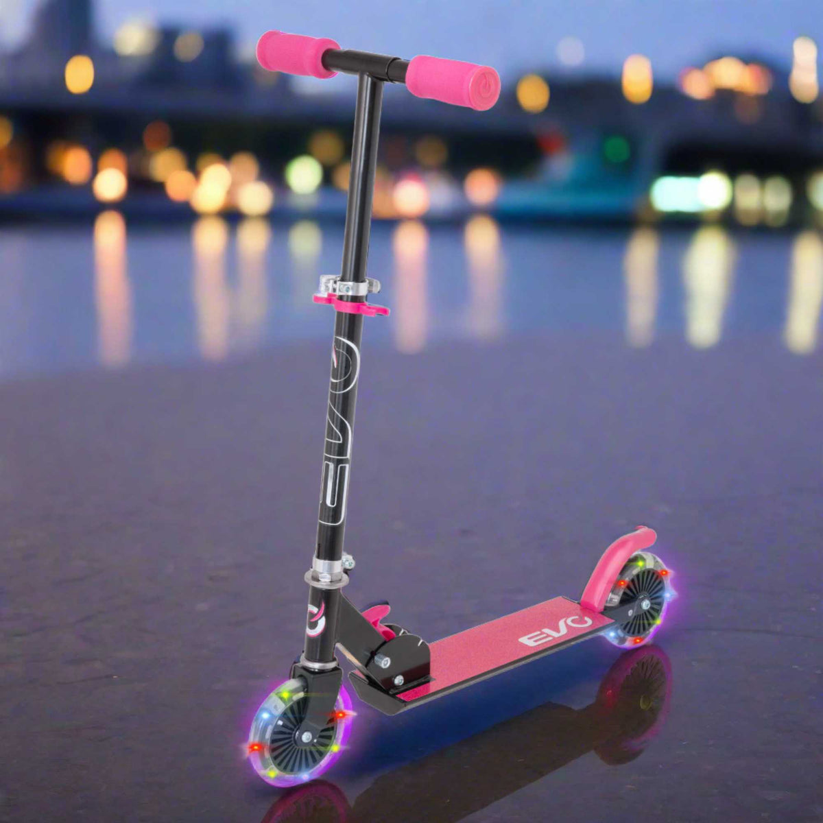 EVO Children&#39;s Light Up Inline Scooter for Kids Ages 5 and Up with LED Wheels and Adjustable Handlebar, perfect for enhancing motor skills and outdoor fun.