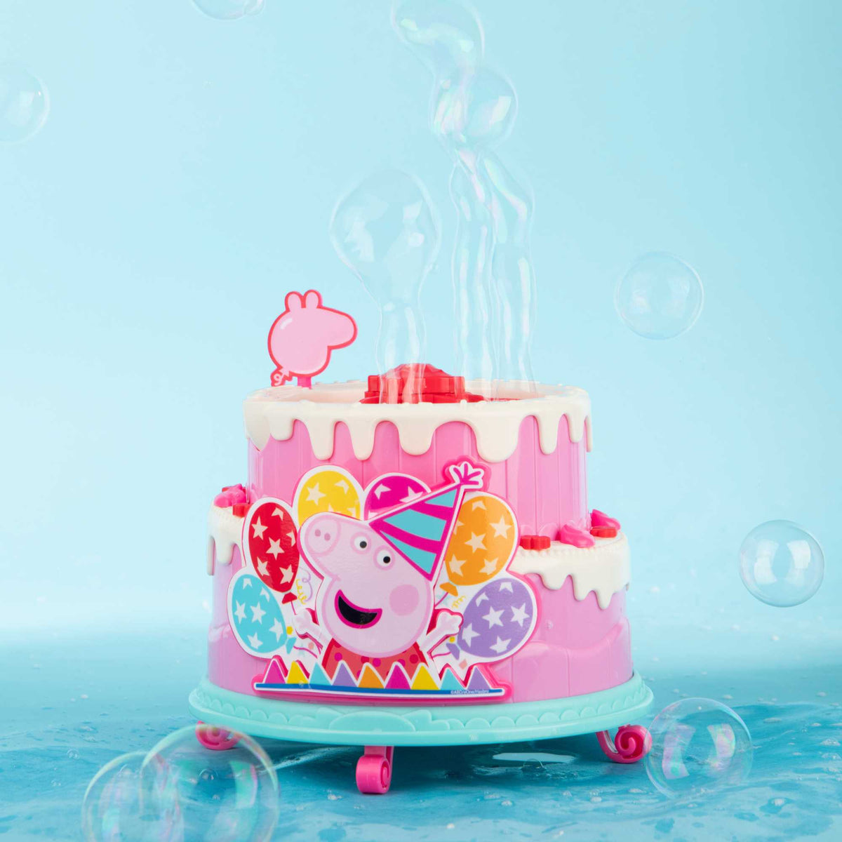 Peppa Pig Birthday Cake Bubble Machine featuring fun cake design, blowing bubbles for kids&#39; parties, playdates, and outdoor activities, perfect for Peppa Pig fans.