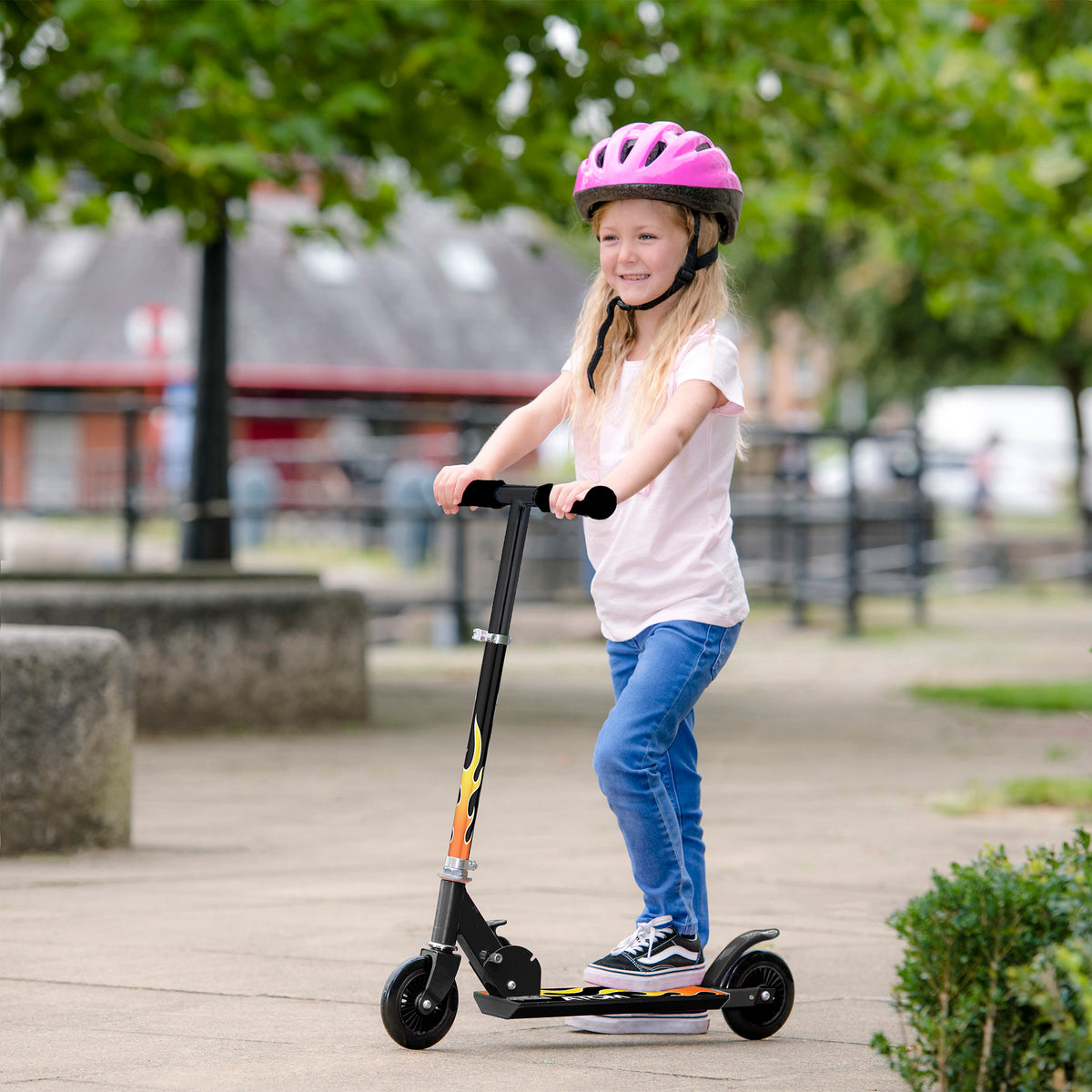 ATOM Inline 2-wheeled children&#39;s scooter in a sleek black flames theme, featuring a robust design, fiery graphics, and an exciting style perfect for young adventurers