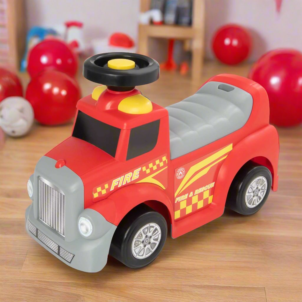 EVO Foot 2 Floor Ride-On Fire Engine for children aged 1 and up, featuring a vibrant red design, wide wheelbase, and foot-to-floor propulsion for safe and imaginative play.