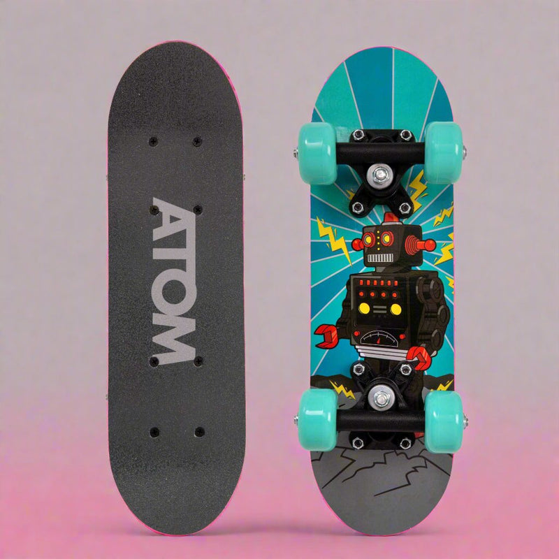 ATOM 17-inch Children's Skateboard with a vibrant graphic design, durable deck, and smooth-rolling wheels, ideal for young beginners learning to skateboard.