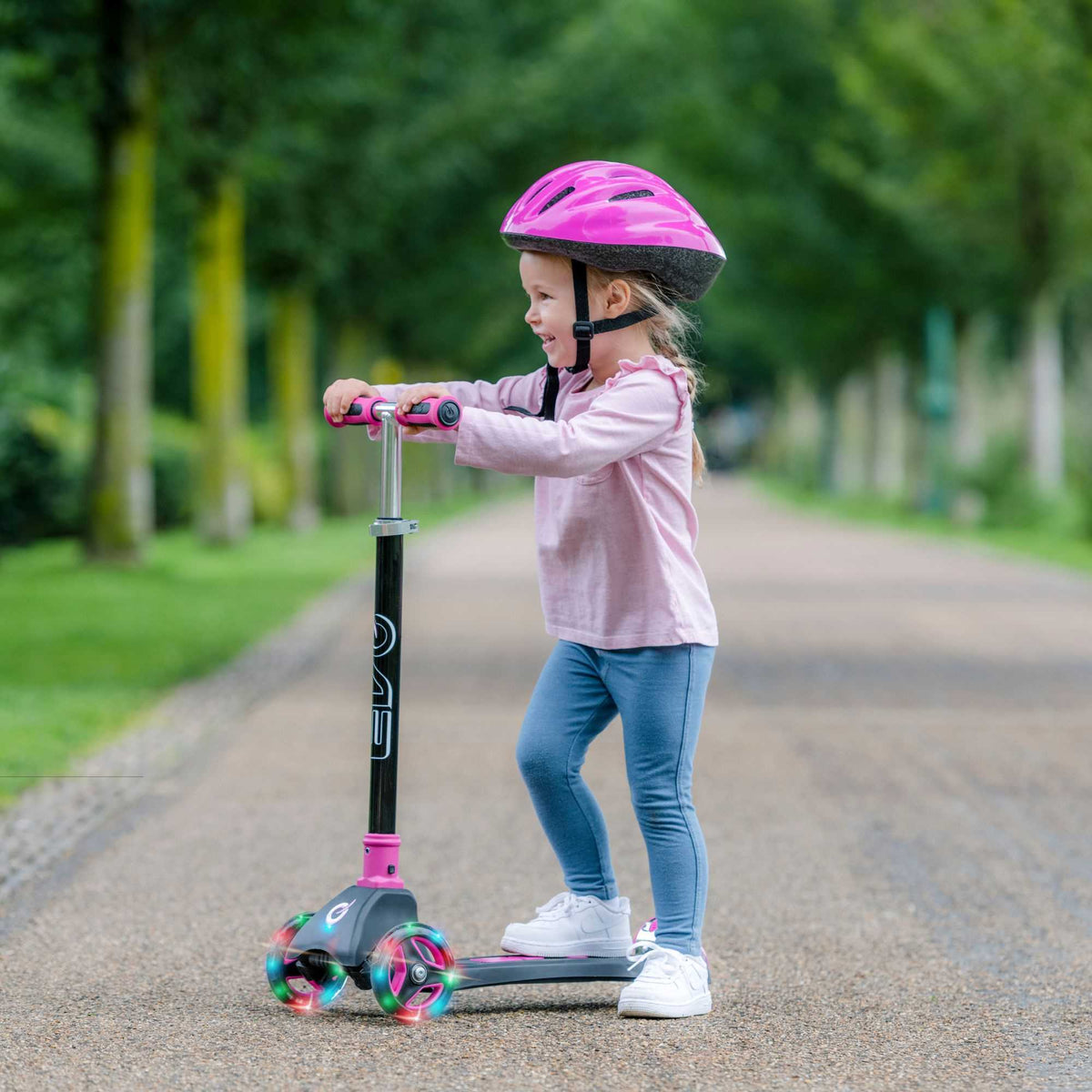 EVO Kids 3 Wheeled Scooter with light up wheels, featuring a sturdy design, bright colours, perfect for young riders.