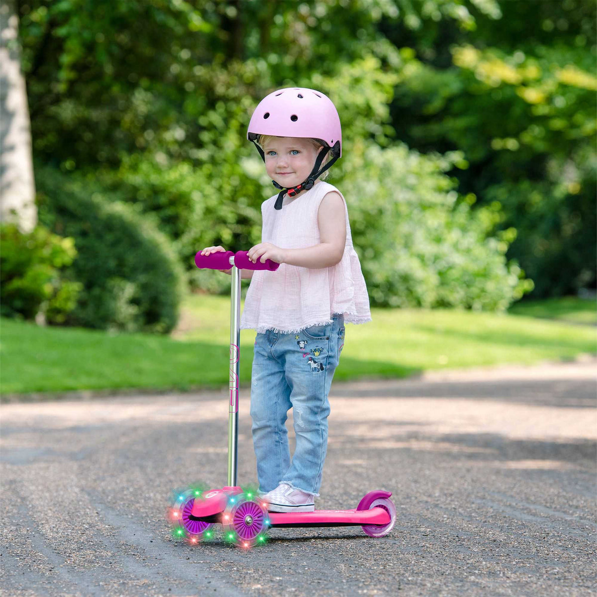 EVO Light Up Move N Groove Scooter for Ages 2 and Up with Lean-to-Steer System and LED Wheels, perfect for young children’s outdoor adventures.