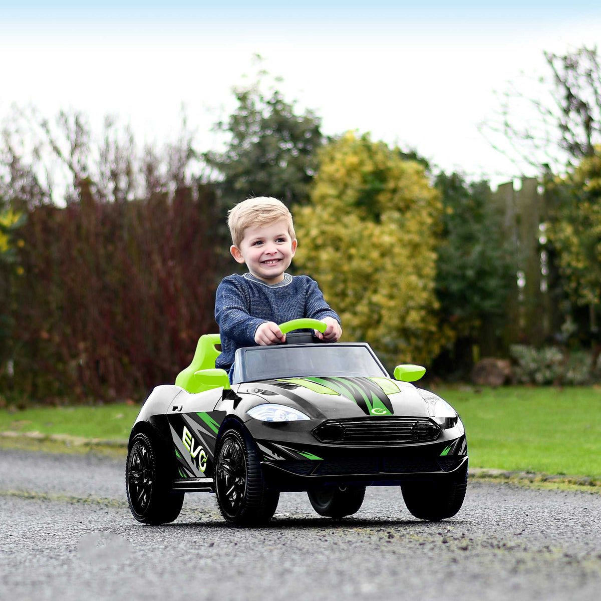 Green EVO Venom Car Ride-On for ages 3+, featuring a bold green colour, rugged rally design, durable frame, wide stable wheels, and easy-grip wheel for safe and adventurous outdoor play.