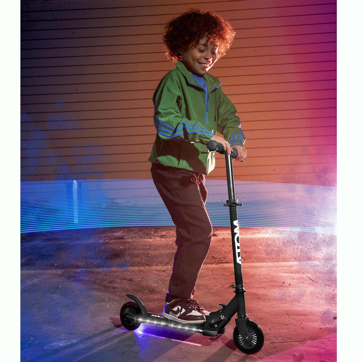 ATOM Night Flash Scooter for Kids – 2-Wheel Light-Up Scooter with LED Flashing Deck and Wheels, Foldable and Adjustable for Ages 5+