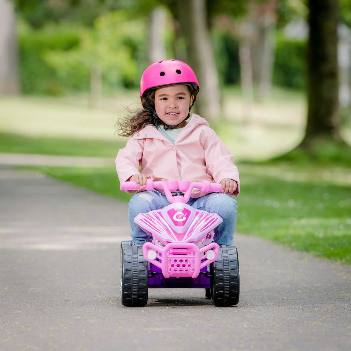 Electric pink EVO Shimmer Quad Ride-On for 2-year-olds, featuring a sturdy four-wheel design, ergonomic seat, and easy-to-grip handlebars, perfect for safe and fun outdoor adventures.