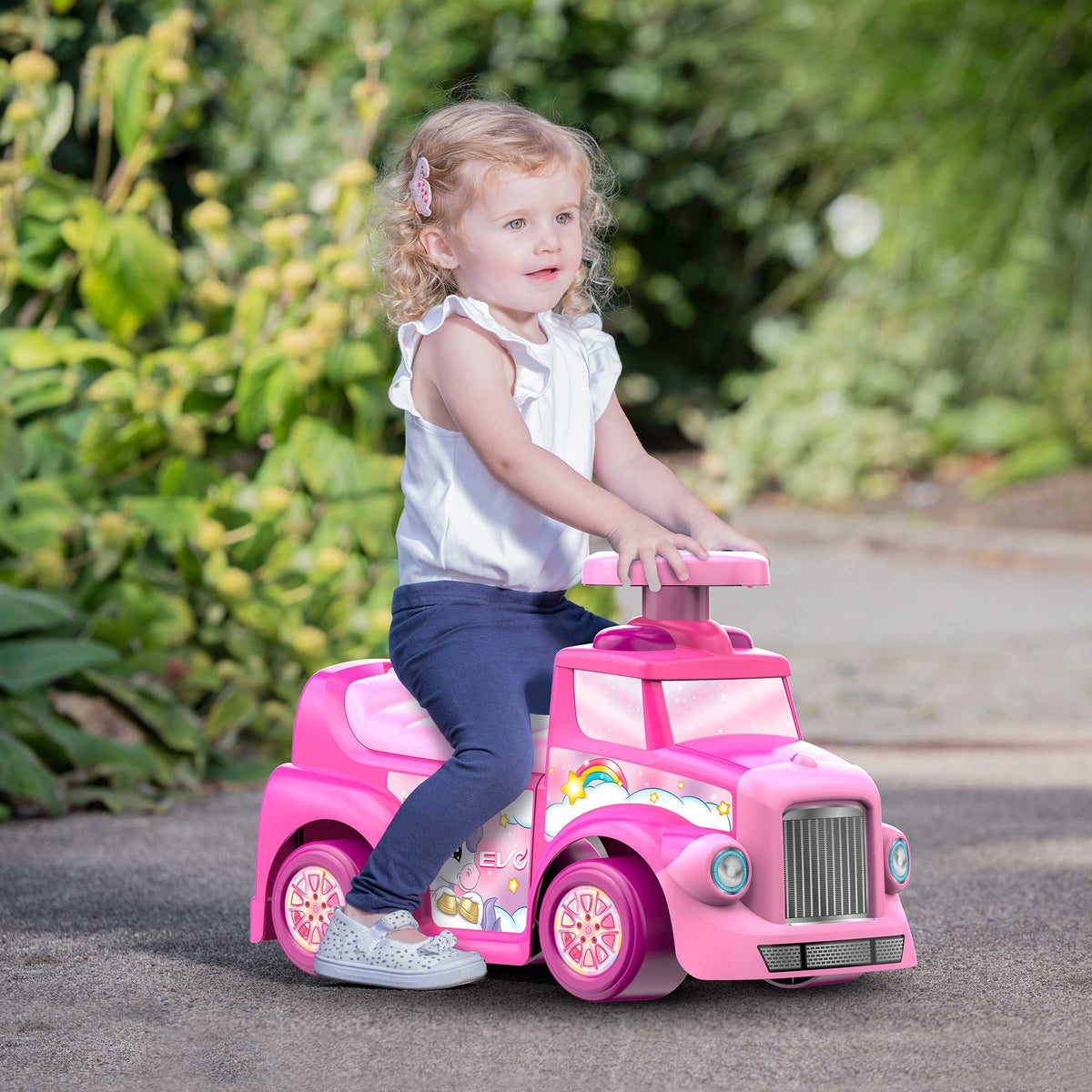 EVO Foot 2 Floor Unicorn Ride-On for toddlers aged 1 and up, featuring a pastel-colored unicorn design, wide wheelbase, and foot-to-floor propulsion for safe and imaginative play.