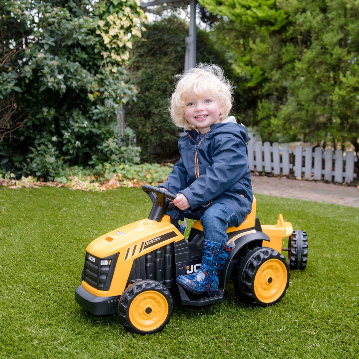 EVO JCB Battery Operated Tractor Ride-On for 2-year-olds, featuring a yellow and black JCB design, battery-powered operation, and a stable, comfortable ride for imaginative farm adventures.