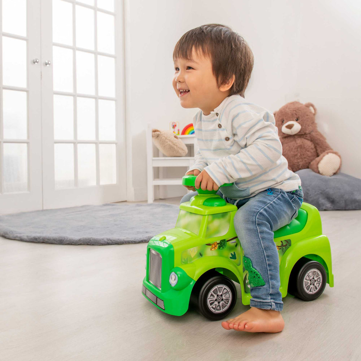 EVO My First Foot-To-Floor Dinosaur Ride-On for toddlers, featuring a colorful dinosaur design, wide wheelbase, and foot-to-floor propulsion for safe and engaging play.