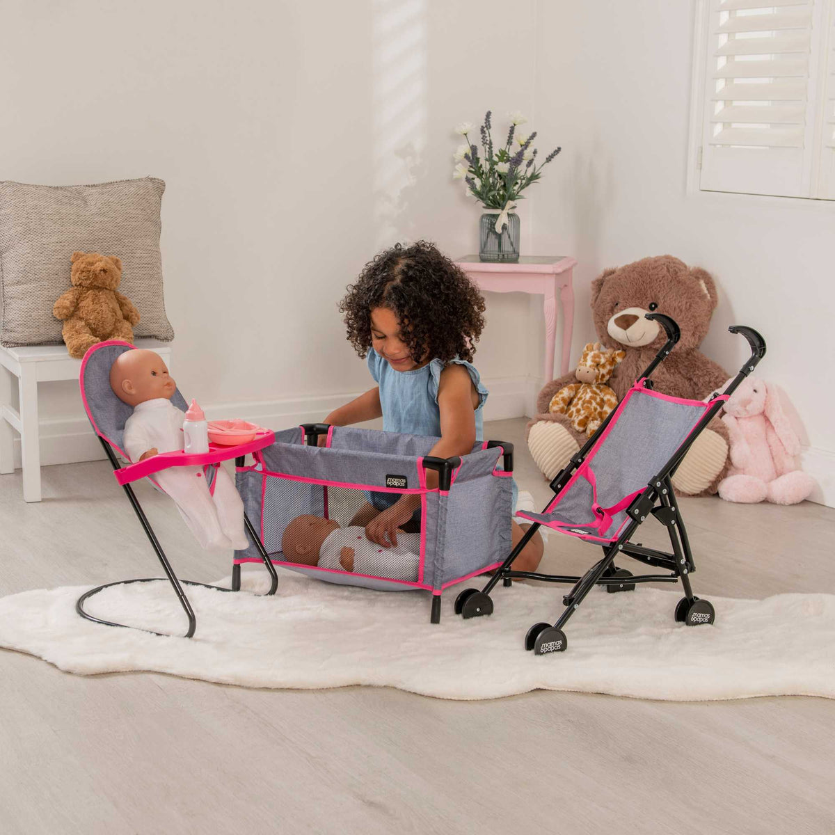 Mamas &amp; Papas Dolls Nursery Playset featuring a variety of accessories for imaginative play, including a crib, high chair, and accessories, perfect for nurturing pretend play with dolls.