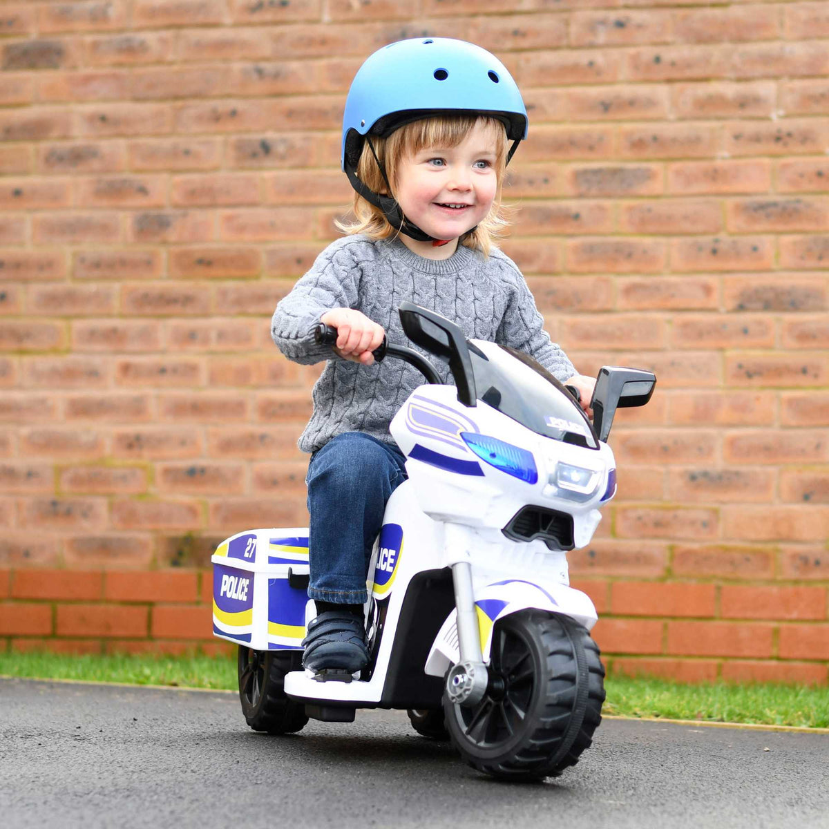 EVO Police Sport Bike Ride On for ages 2+, featuring a realistic police bike design with flashing lights and authentic sounds, durable frame, wide stable wheels, and easy-grip handles for safe and exciting outdoor play.