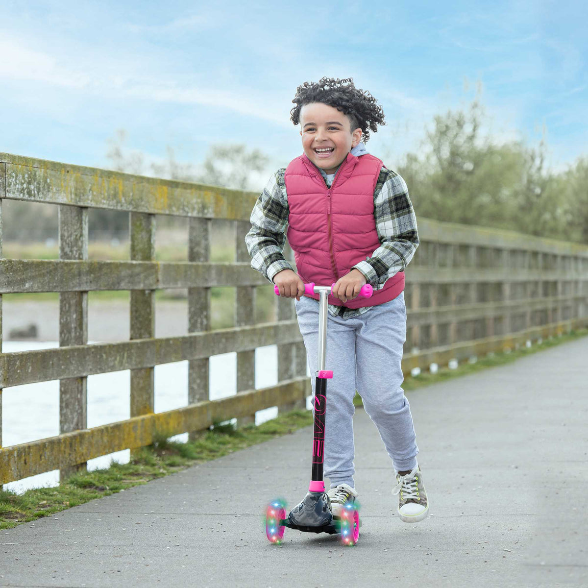 Childrens EVO Eclipse 3 wheeled scooter for ages 3+ in vibrant colours, offering adjustable features for growing kids, perfect for enhancing motor skills and outdoor fun.