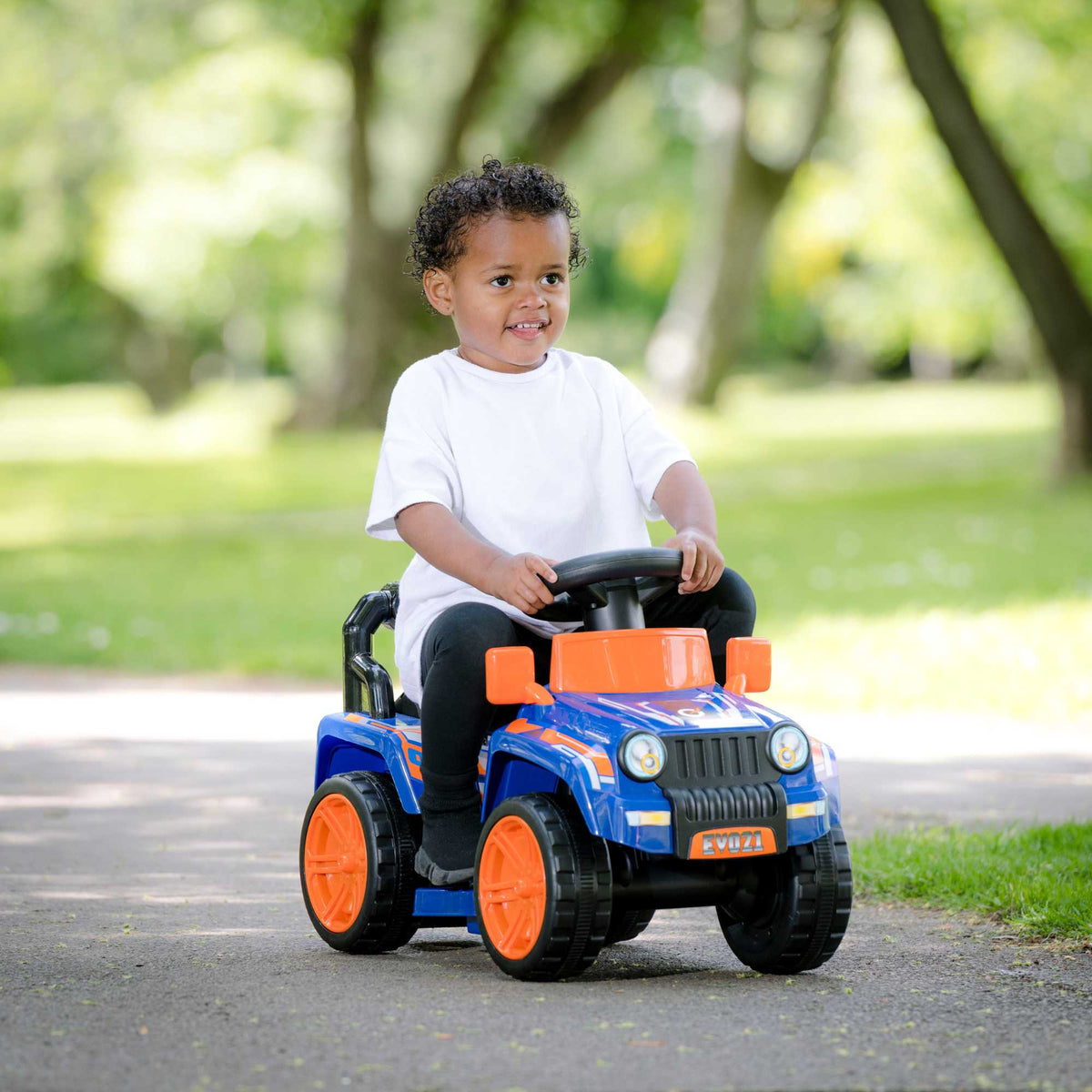 Blue EVO Zoom 4x4 Ride-On Truck for kids ages 3 and up, featuring realistic design, durable construction, and all-terrain wheels for outdoor adventures.