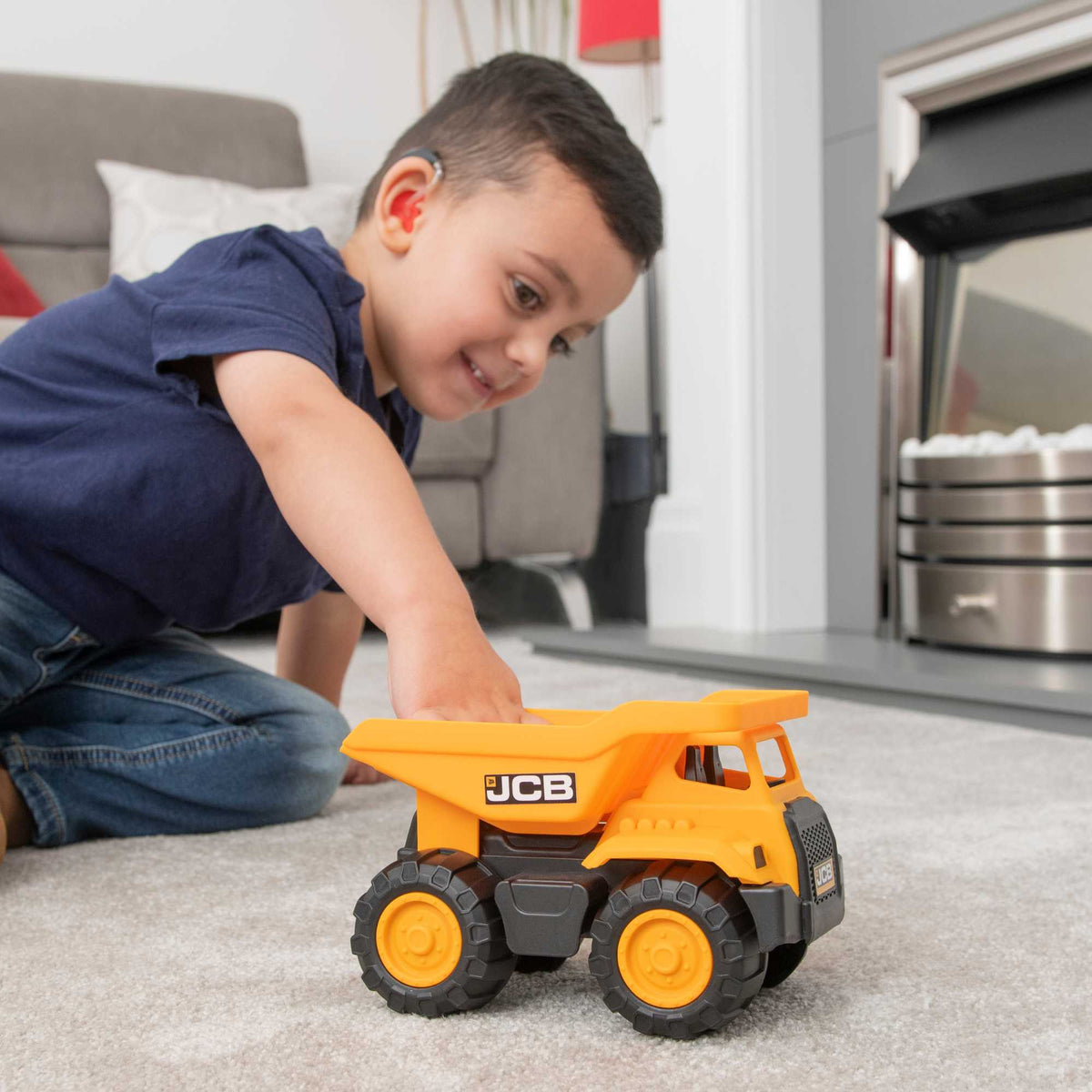 7-inch JCB Dump Truck Toy featuring realistic design, rugged wheels, and a functional dump bed, perfect for indoor and outdoor play for children.