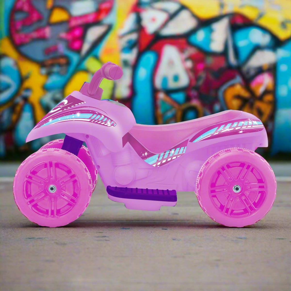 Electric pink EVO Shimmer Quad Ride-On for 2-year-olds, featuring a sturdy four-wheel design, ergonomic seat, and easy-to-grip handlebars, perfect for safe and fun outdoor adventures.