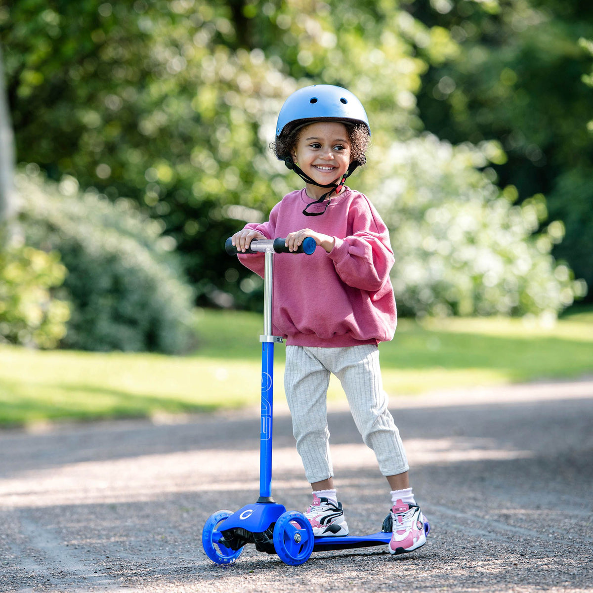 Children&#39;s EVO 3-in-1 Cruiser for ages 1+ in vibrant colours, offering adjustable features for growing kids, perfect for enhancing motor skills and outdoor fun.