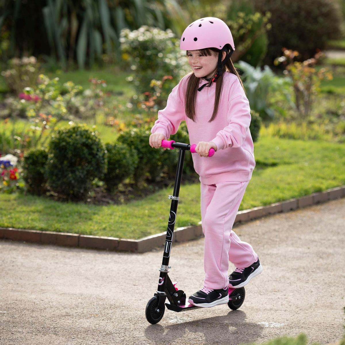 EVO Children&#39;s Inline Scooter for Kids Ages 5 and Up with Adjustable Handlebar, perfect for enhancing motor skills and outdoor fun.