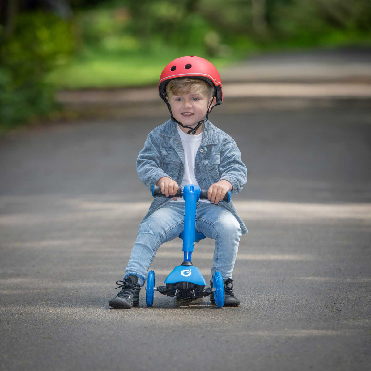 Children&#39;s EVO 3-in-1 Cruiser for ages 1+ in vibrant colors, offering adjustable features for growing kids, perfect for enhancing motor skills and outdoor fun.