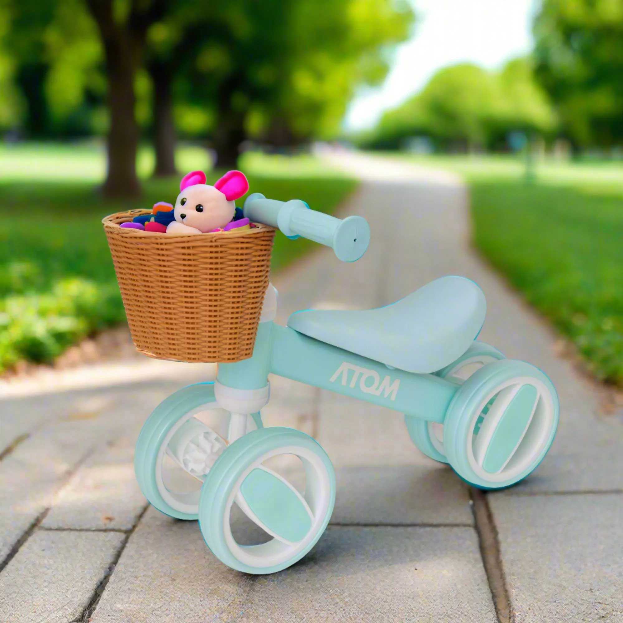 Atom Bobble Bike with Basket in Mint Green, charming children's bicycle with front basket. Perfect Balance Bike for training.