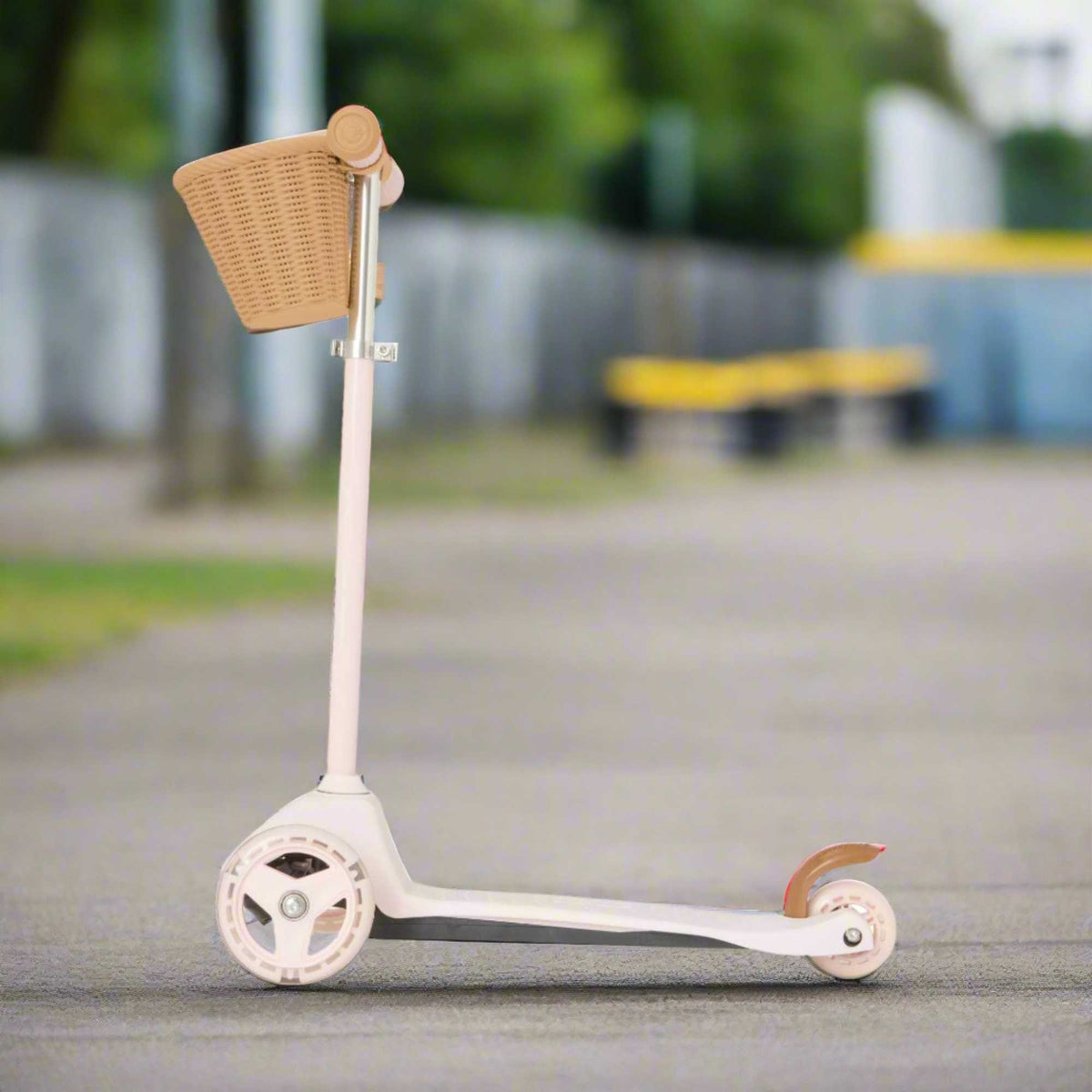 EVO Mini Cruiser Scooter with Basket, featuring a stable three-wheel design, adjustable handlebars, and lightweight, durable construction, perfect for young children’s outdoor adventures.