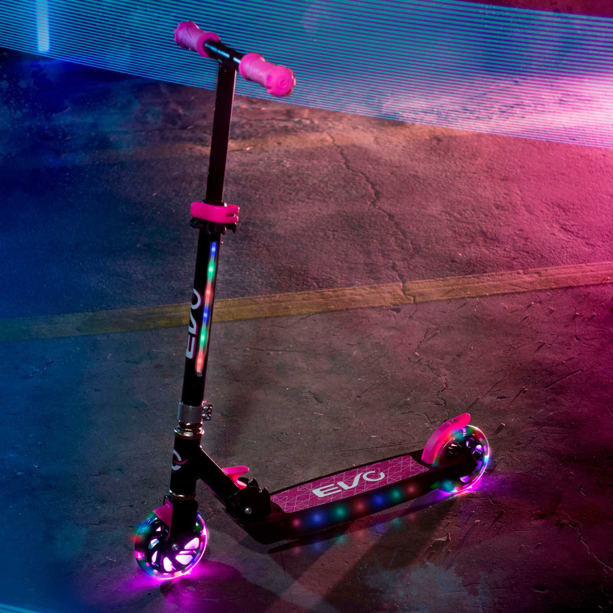 EVO Children&#39;s Light Up Light Blast Scooter for Kids Ages 5 and Up with LED Wheels and Adjustable Handlebar , perfect for enhancing motor skills and outdoor fun.