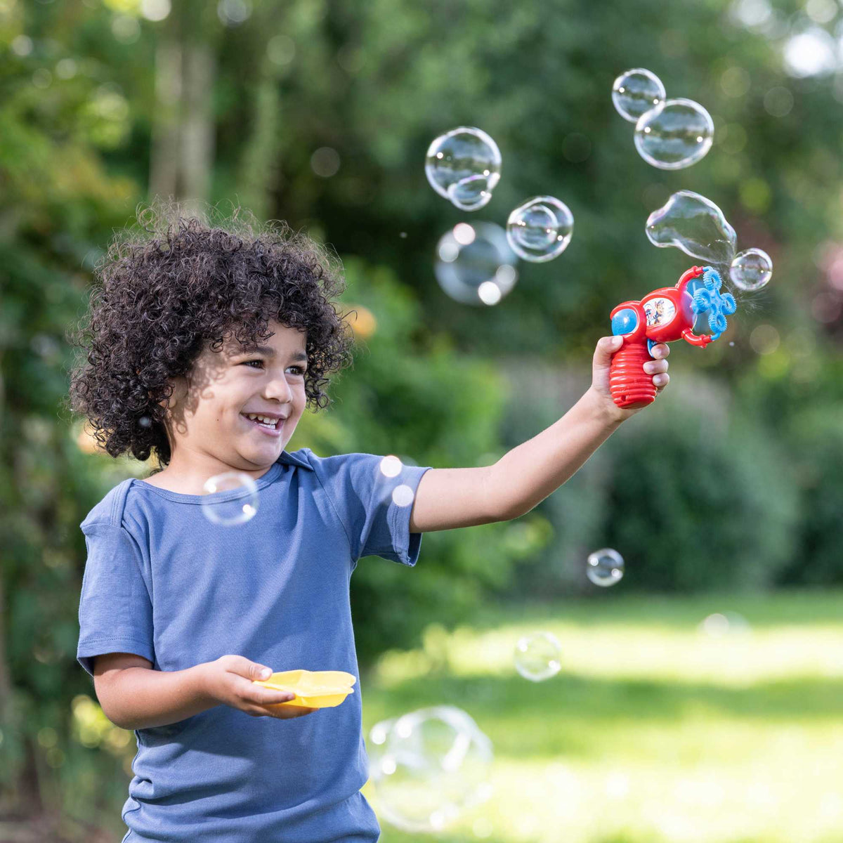 Paw Patrol Bubble Bundle featuring a bubble gun, bubble wands, and bubble solution - perfect for kids&#39; outdoor fun and playtime adventures!