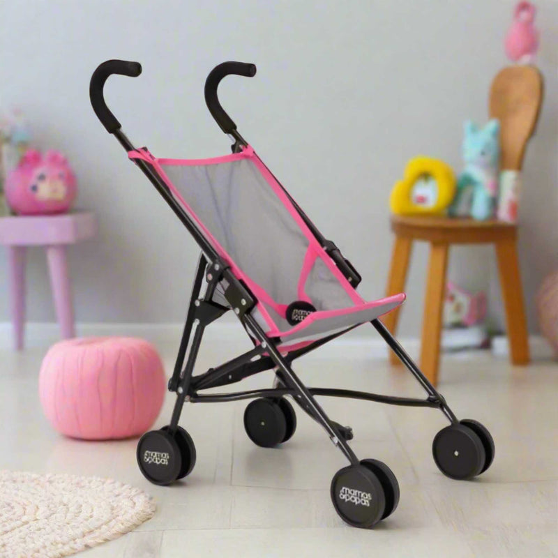 Mamas & Papas Junior Doll Stroller in pink and grey, featuring a foldable and lightweight design for easy storage and portability, ideal for children's imaginative play with dolls.