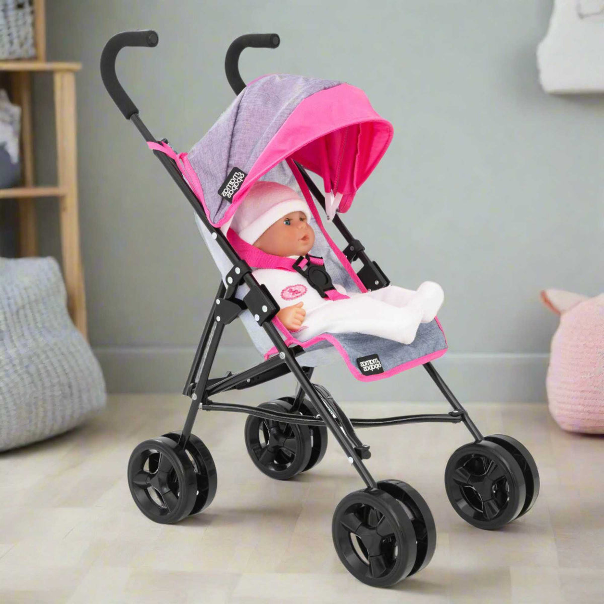 Mamas &amp; Papas Junior Cruise Stroller, designed for children&#39;s imaginative play, featuring a sleek and modern design with sturdy frame and smooth-rolling wheels, perfect for pretend outings with dolls.