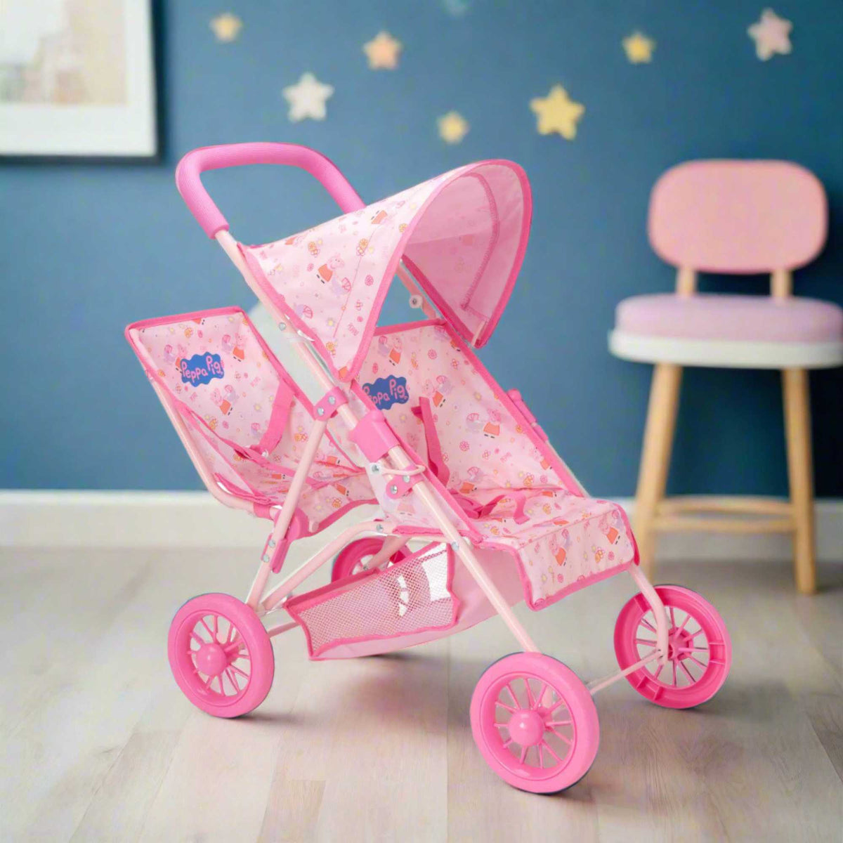 Peppa Pig Tandem Twin Doll Stroller: A pink double stroller with Peppa Pig graphics, designed for carrying two dolls side by side, ideal for toddlers and imaginative play.