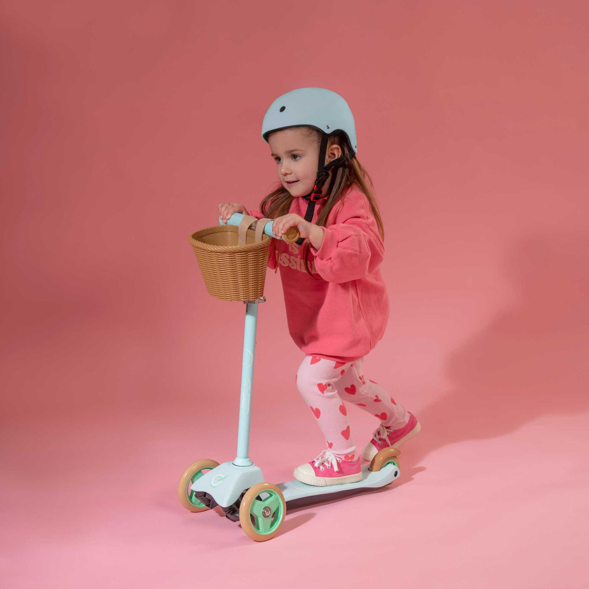 EVO Mini Cruiser Scooter with Basket, featuring a stable three-wheel design, adjustable handlebars, and lightweight, durable construction, perfect for young children’s outdoor adventures.