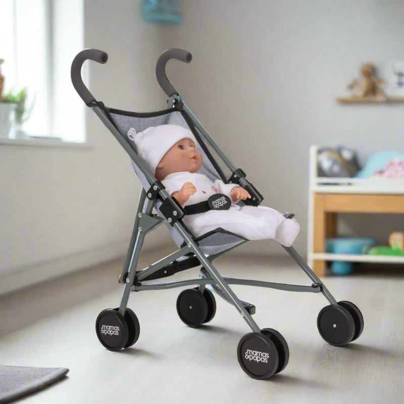 Mamas & Papas Junior Doll Stroller in grey, featuring a foldable and lightweight design for easy storage and portability, ideal for children's imaginative play with dolls.