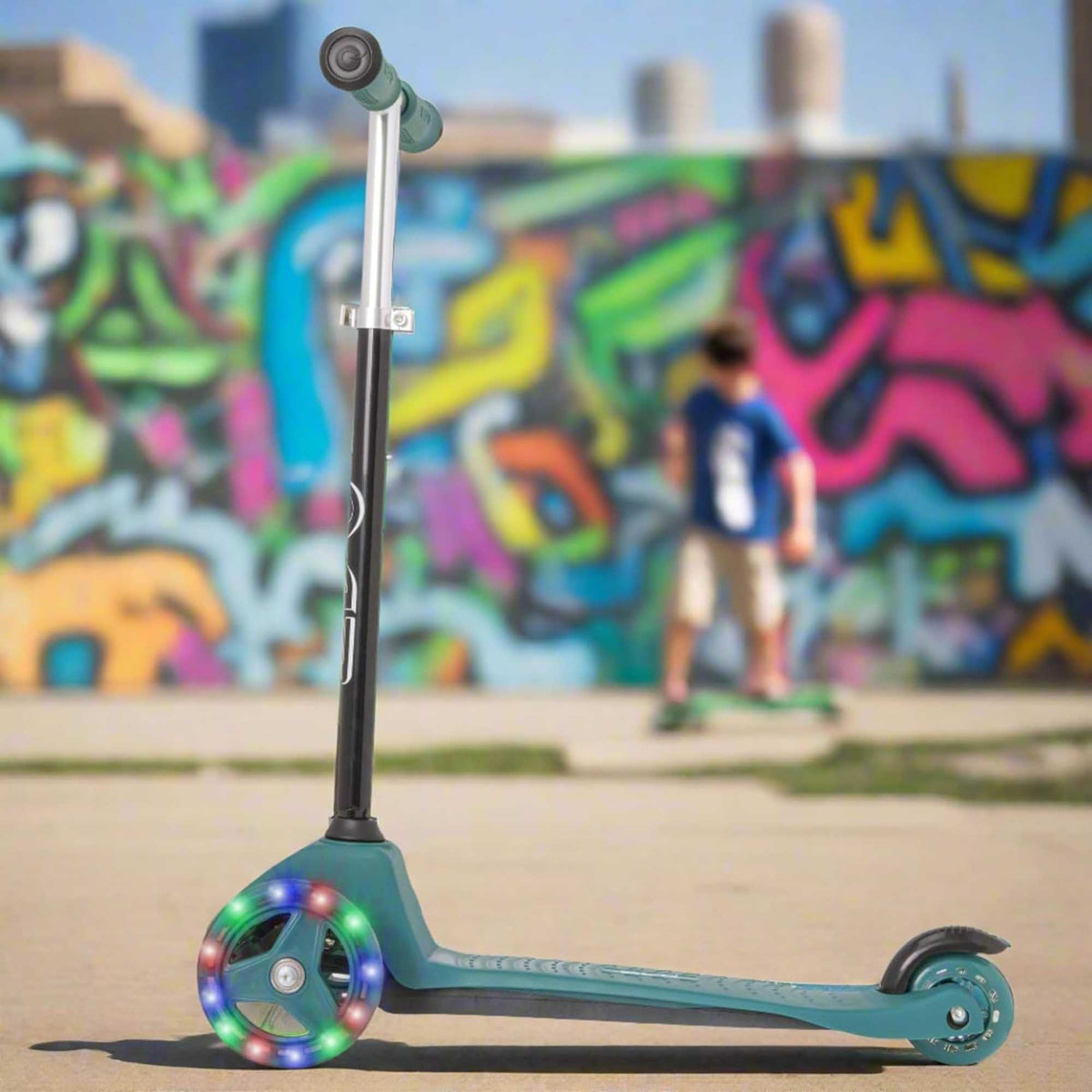 EVO Mini Cruiser Scooter , featuring a stable light up three-wheel design, adjustable handlebars, and lightweight, durable construction, perfect for young children’s outdoor adventures.