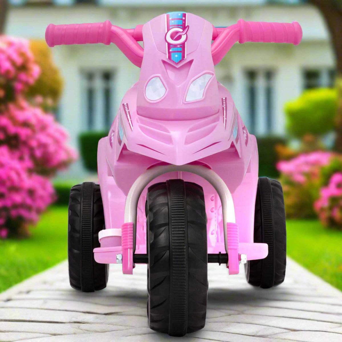 Electric pink EVO Shimmer Trike Ride-On for 2-year-olds, featuring a stable three-wheel design, ergonomic seat, and push-button acceleration for safe and exciting outdoor adventures.