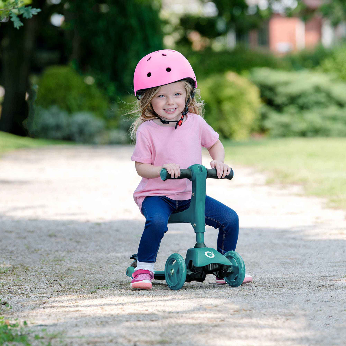 Children&#39;s EVO 3-in-1 Cruiser for ages 1+ in vibrant colors, offering adjustable features for growing kids, perfect for enhancing motor skills and outdoor fun.