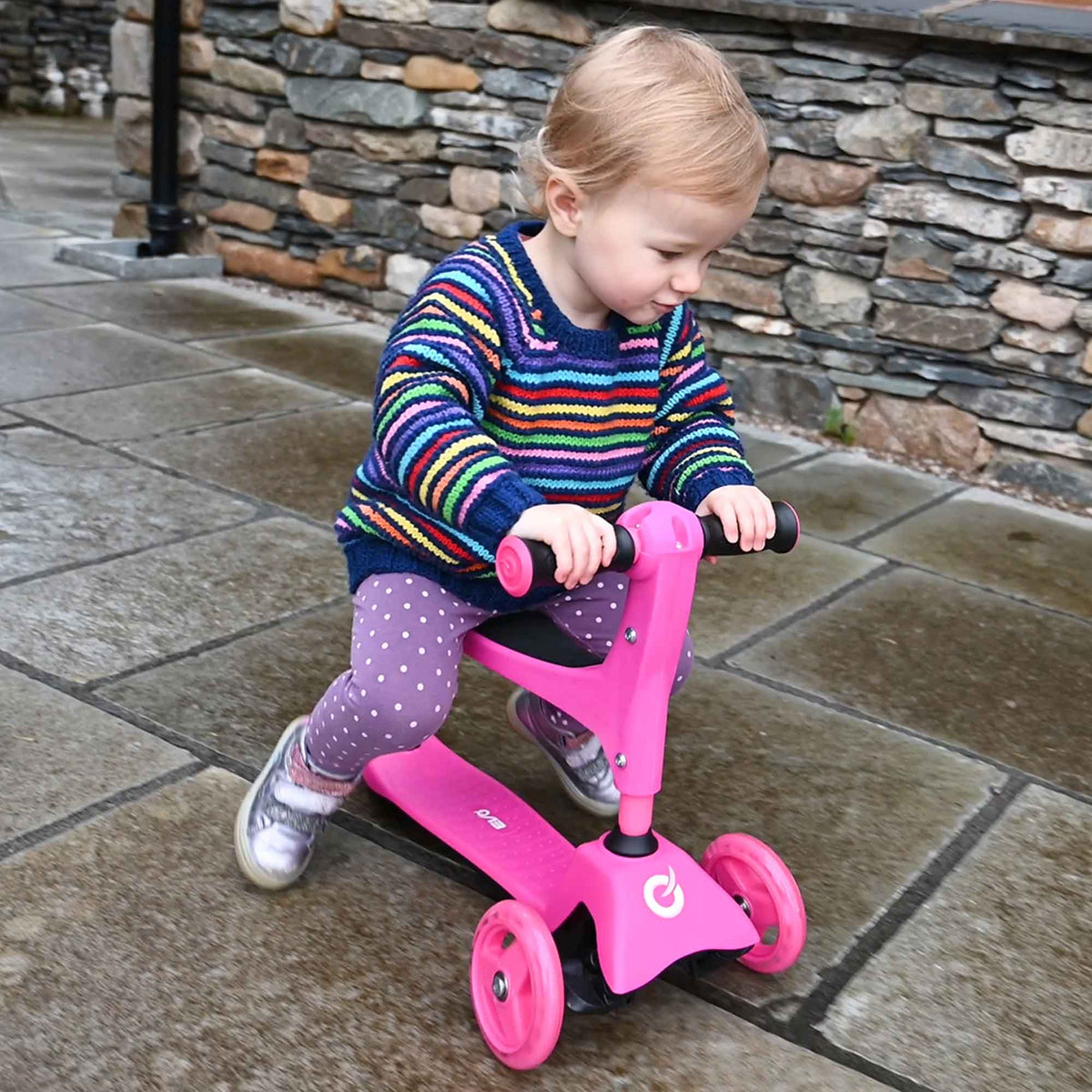 Children&#39;s EVO 3-in-1 Cruiser for ages 1+ in vibrant colors, offering adjustable features for growing kids, perfect for enhancing motor skills and outdoor fun.