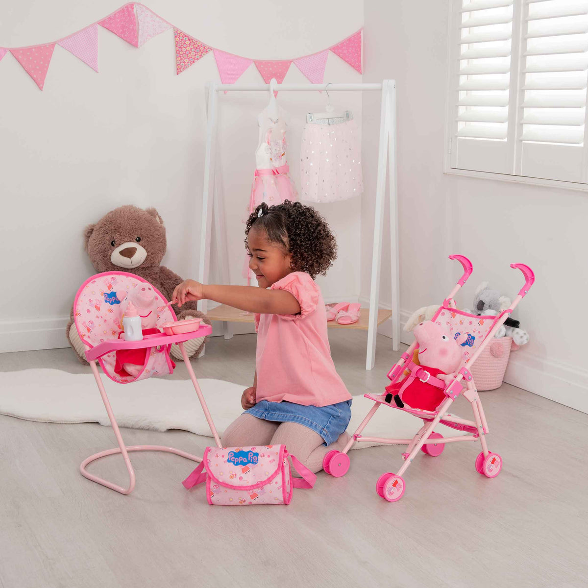 Peppa Pig Nursery Bundle - 7 Piece Playset: A colourful Peppa Pig-themed toy set including a high chair, stroller, Feeding set, perfect for toddlers&#39; imaginative play and doll care.