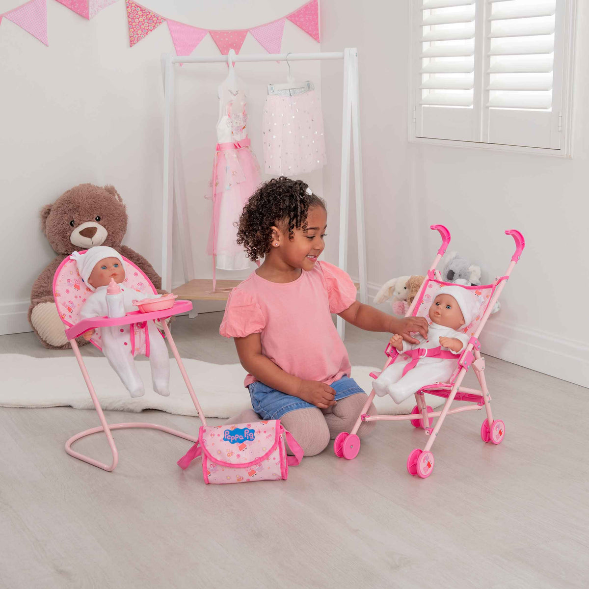 Peppa Pig Nursery Bundle - 7 Piece Playset: A colourful Peppa Pig-themed toy set including a high chair, stroller, Feeding set, perfect for toddlers&#39; imaginative play and doll care.