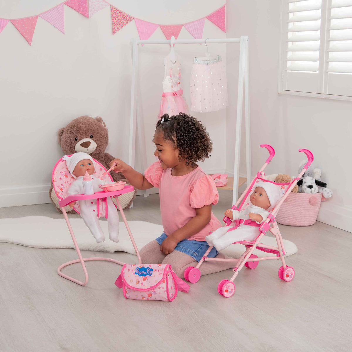 Peppa Pig Nursery Bundle - 7 Piece Playset: A colourful Peppa Pig-themed toy set including a high chair, stroller, Feeding set, perfect for toddlers&#39; imaginative play and doll care.