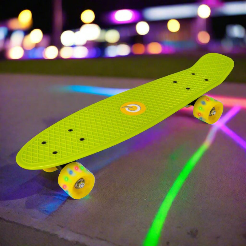 Children’s EVO 22-inch Penny Board in pink with light-up wheels, showcasing a compact design and vibrant retro style, perfect for young riders. The board features a textured grip surface and smooth, illuminated wheels that light up during movement. 