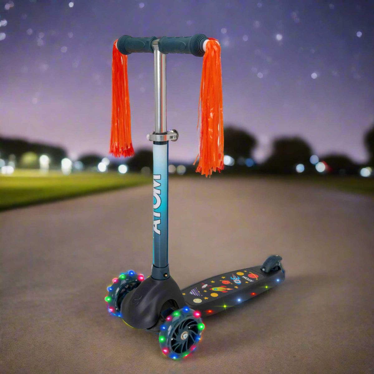 ATOM Eclipse Kids 3 Wheeled Scooter in vibrant solar theme, featuring a sturdy design, bright colors, and a space-inspired pattern perfect for young riders