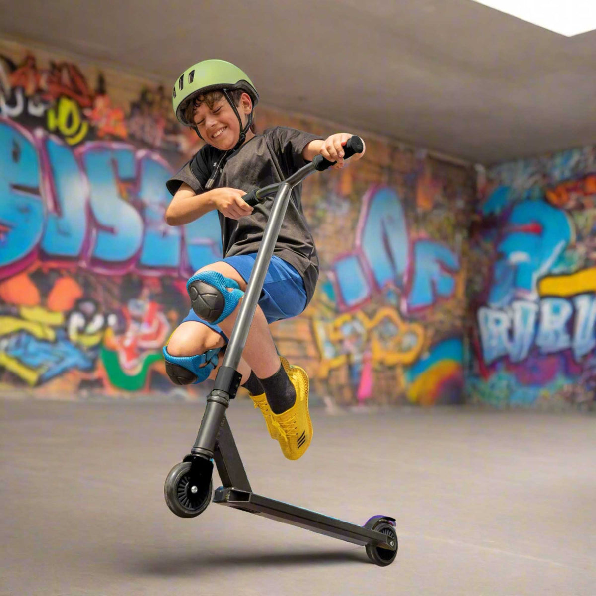 Children’s EVO Grey Viper Stunt Scooter with sleek grey finish, reinforced handlebars, non-slip deck, and high-traction wheels, designed for stunt riding and tricks. Features viper-inspired graphics and durable construction for performance at skateparks and streets.