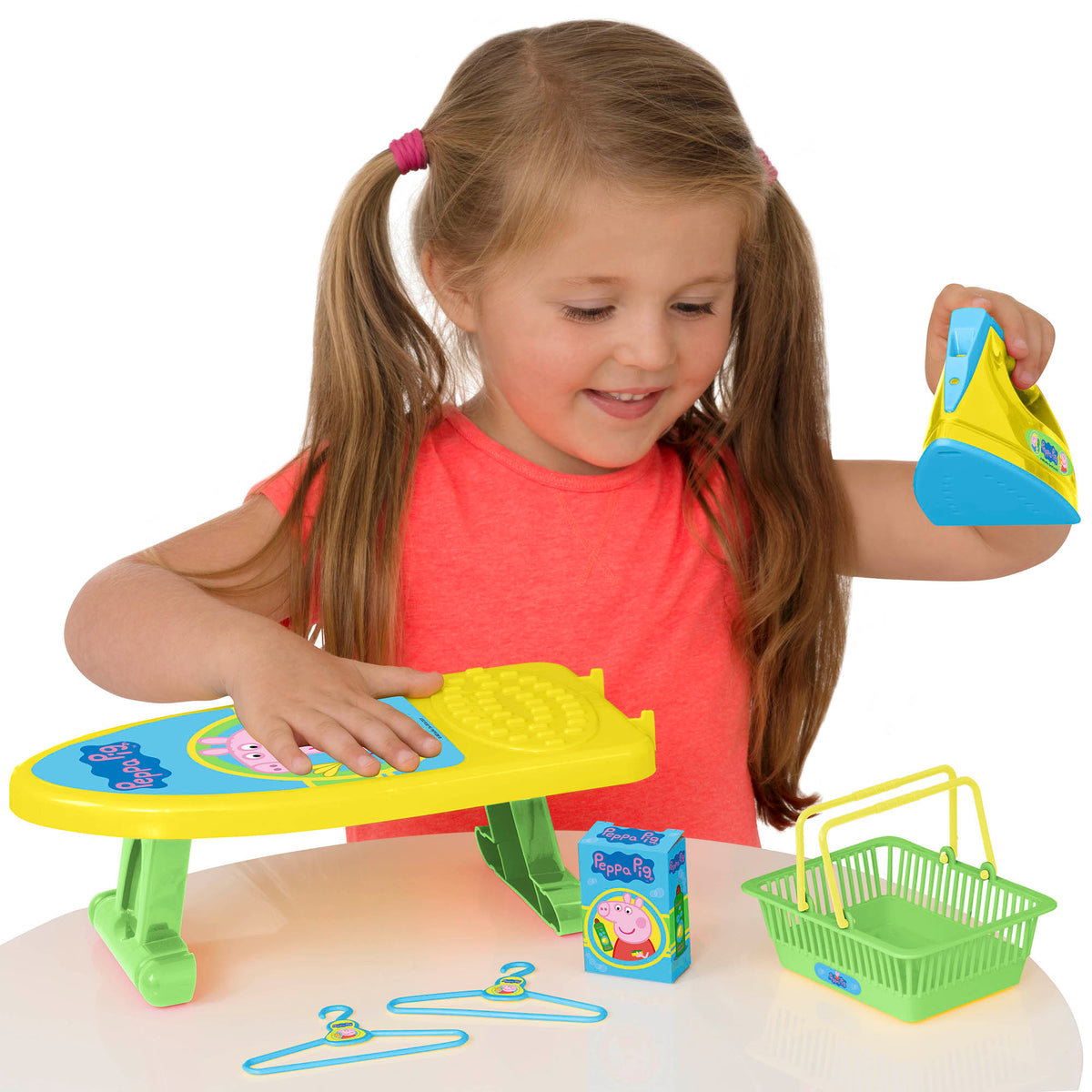 image of child playing with the peppa pig little helper set