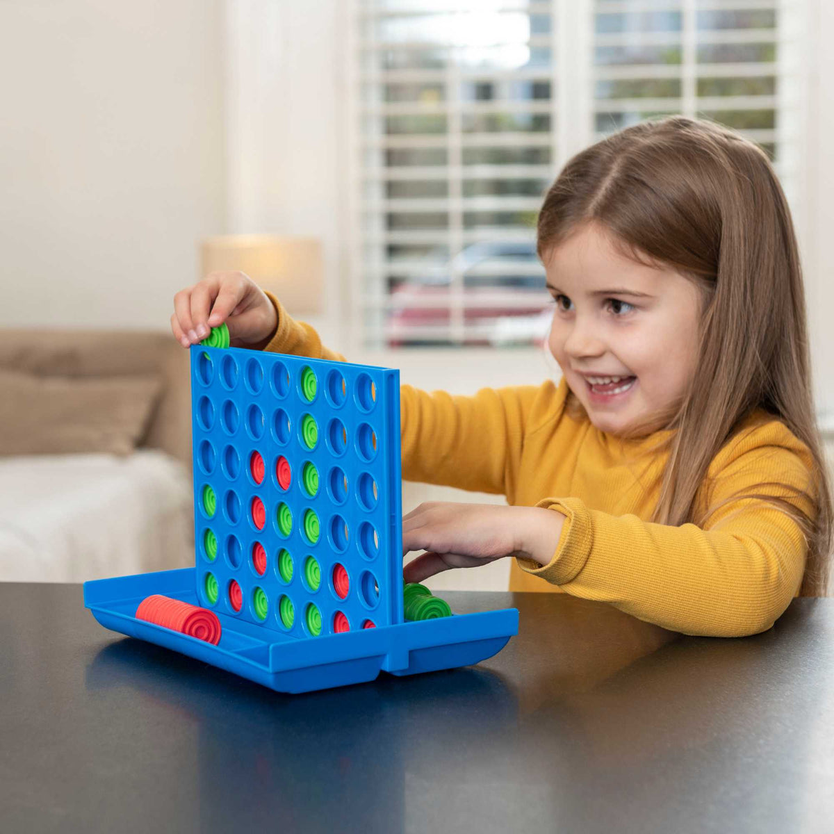 Epic Fun Line Up 4 Game featuring a vibrant game board and colourful pieces, perfect for family gatherings and strategic fun for all ages.